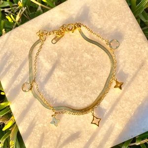 Clove and Flower Gold Charm Snake Bracelet